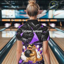 Load image into Gallery viewer, Women’s purple bearded dragon bowling polo shirt, back view on female model in bowling lane 