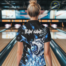 Load image into Gallery viewer, Person wearing a black shirt with a wolf design and 'TEAM NAME' text in a bowling alley.