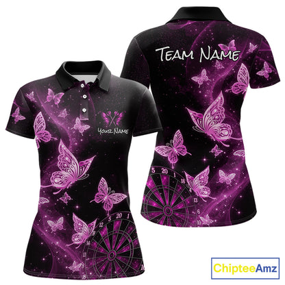 A women's short-sleeve polo shirt shown from the front and back on a white background. The shirt has a black base with a vibrant purple and pink galaxy print featuring glowing butterflies, stars, and a dartboard graphic.
