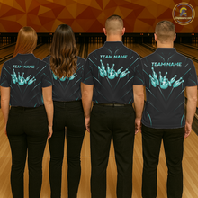 Load image into Gallery viewer, Four people wearing black bowling shirts with team name and design on a bowling alley.