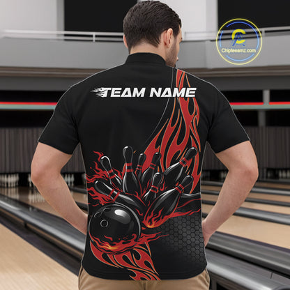Front view male model at bowling venue wearing black quarter zip shirt showcasing red flame bowling ball striking pins in dynamic motion design.