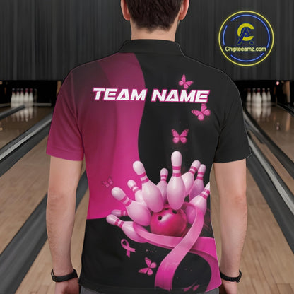 Back view of a male model in a bowling venue wearing a black and pink polo shirt, showcasing awareness ribbon and butterfly bowling design elements.