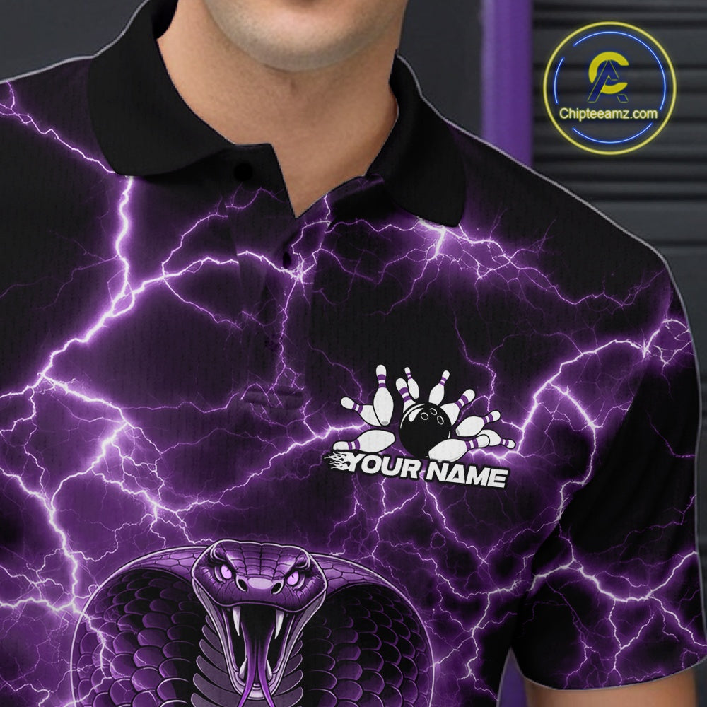 Close-up left chest detail of a bowling polo featuring a purple cobra coiled around a bowling ball with lightning artwork.