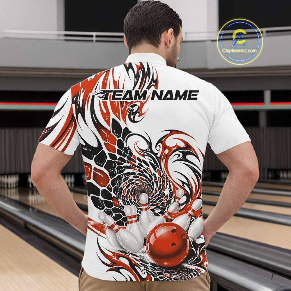 Male model inside a bowling center wearing a white bowling quarter-zip shirt with orange and black tribal graphics and a red bowling ball striking pins