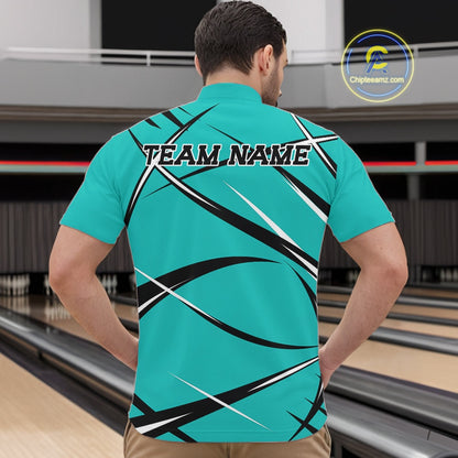 Front view of a male bowler wearing a turquoise blue, black, and white bowling quarter zip shirt in a bowling lane