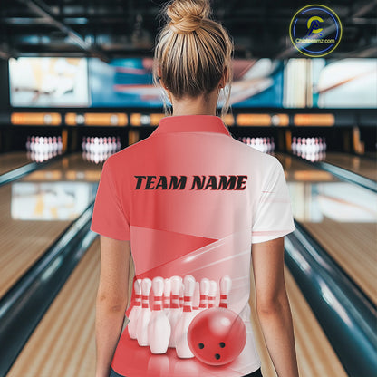 Female model back view in a bowling lane wearing a quarter zip shirt with bowling ball and pins arranged through a pink gradient design.