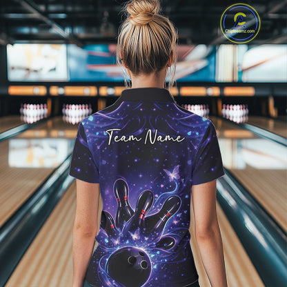 Back view of a female model in a blue and purple bowling quarter-zip shirt displaying butterfly-accented bowling artwork.