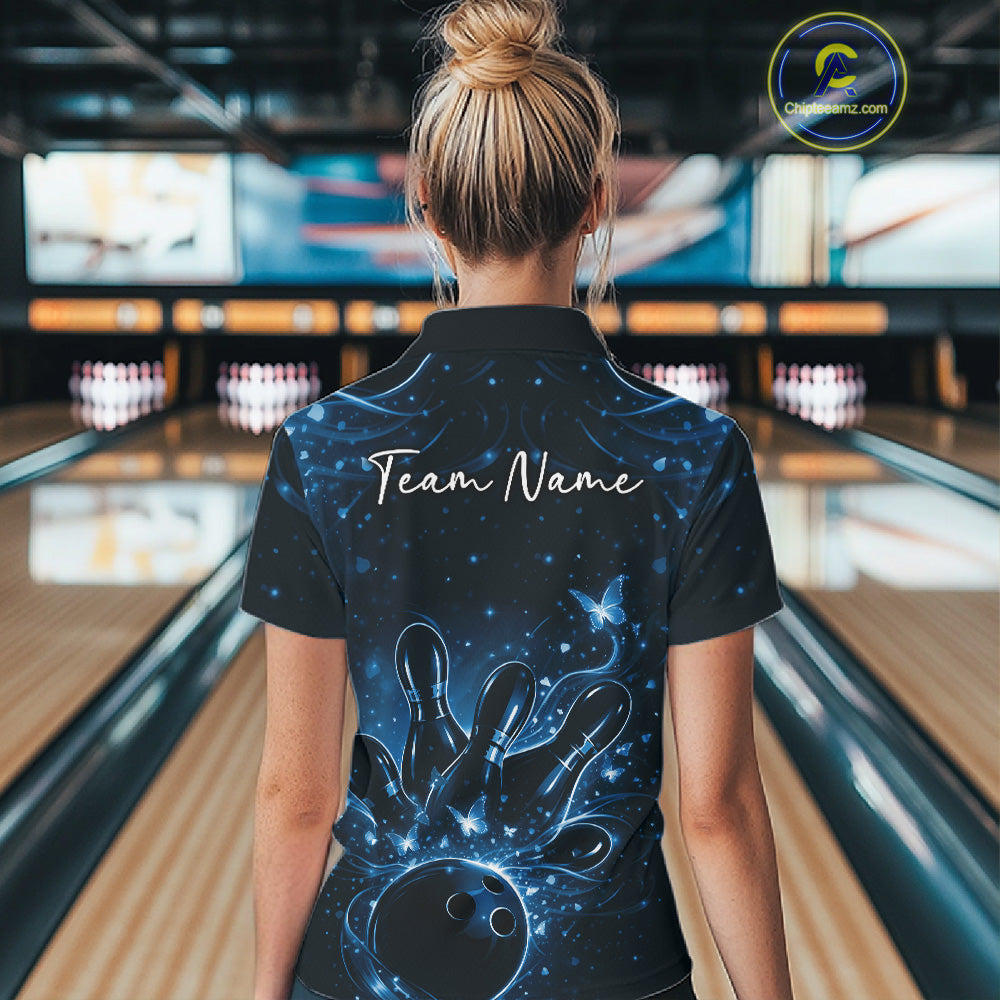 Back view of a female model in a black and blue bowling quarter-zip shirt with butterfly-themed bowling artwork.
