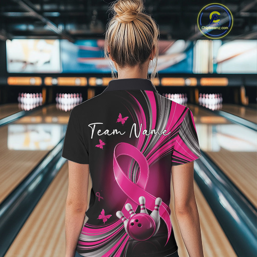 Female model in a black and pink bowling quarter zip with breast cancer awareness ribbons, small butterflies, and bowling artwork, back view