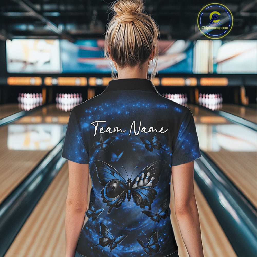 Back view of a female model wearing a bowling quarter-zip shirt with a blue and black butterfly motif and smoky background graphics.