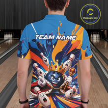 Load image into Gallery viewer, Back view of a male model wearing a bowling polo shirt featuring a crowned cartoon bowling ball holding a royal scepter with animated bowling pins, colorful paint splashes, and festive artwork in a bowling lane.