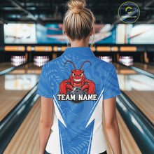 Load image into Gallery viewer, Back view of a female model in a bowling alley wearing a blue custom bowling polo shirt with a funny aggressive crawfish holding a bowling ball in a sportswear-style design.