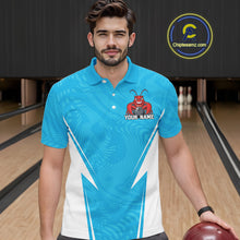 Load image into Gallery viewer, Front view of a male model in a bowling alley wearing a blue custom bowling polo shirt with a funny aggressive crawfish holding a bowling ball in a sportswear-style design.