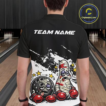 Back view of a male bowler wearing a black and white polo shirt, boxing-style bowling ball and pin design with humorous beaten-up character illustration.