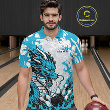 Load image into Gallery viewer, Man wearing a blue and white dragon-themed bowling shirt in a bowling alley.