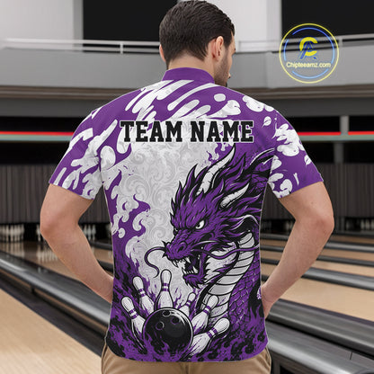 Person wearing a purple bowling shirt with a dragon design in a bowling alley.
