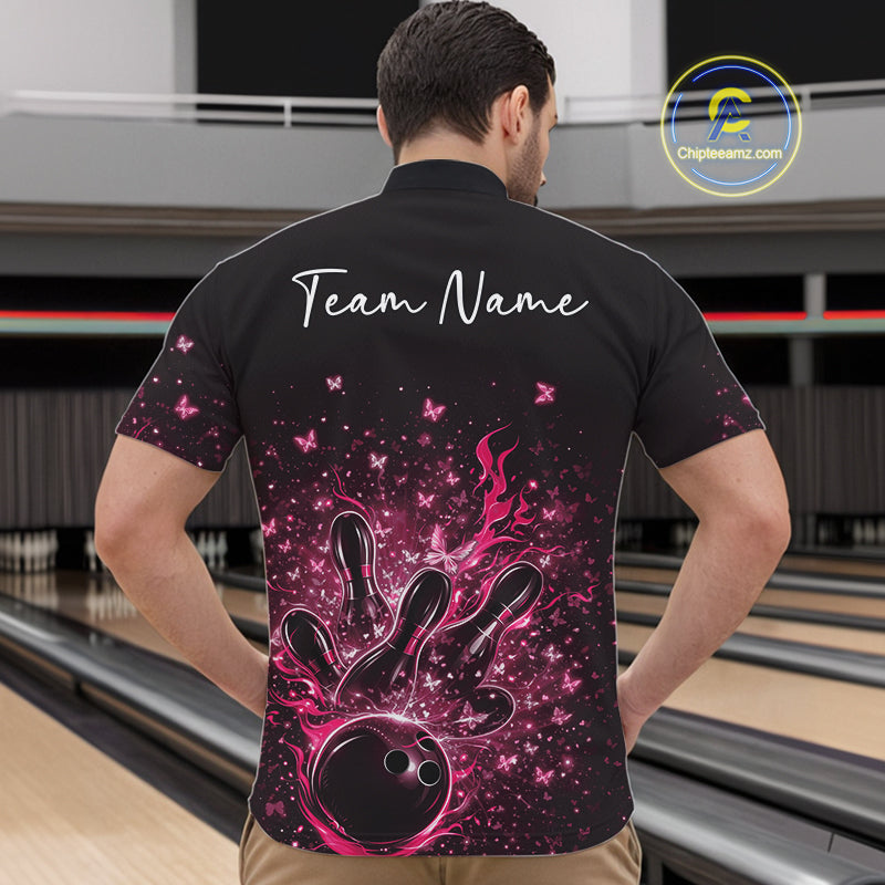 Front view of a male model in a black and pink bowling quarter-zip shirt showing sparkly butterfly bowling graphics.