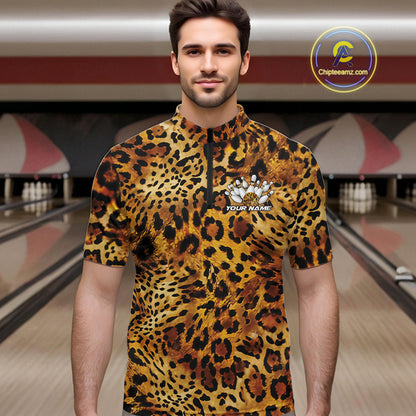 Man in a bowling alley wearing a leopard print men's quarter zip shirt with a customizable text
