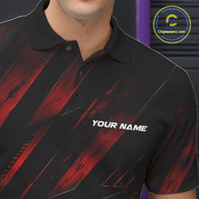 Load image into Gallery viewer, Close-up of the left chest on a black and red bowling polo shirt featuring festive cartoon bowling balls and pins raising frothy beer mugs with confetti and bold diagonal stripe accents.