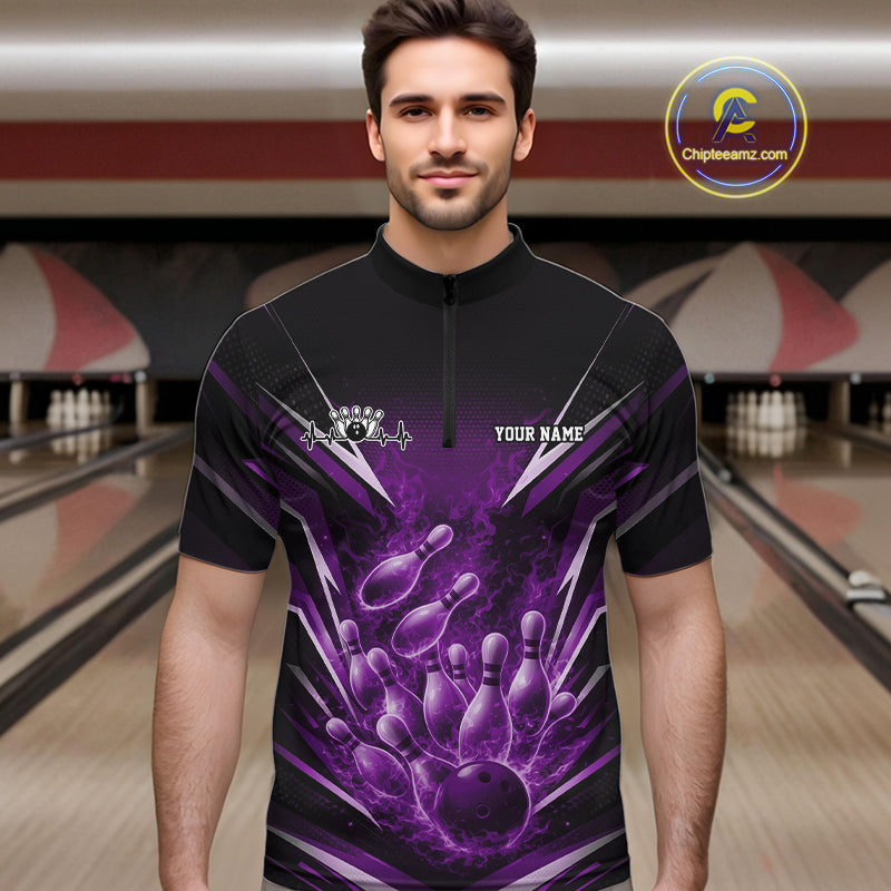 Male model in bowling lane wearing quarter-zip shirt with flaming bowling ball striking pins purple dynamic fire sports artwork