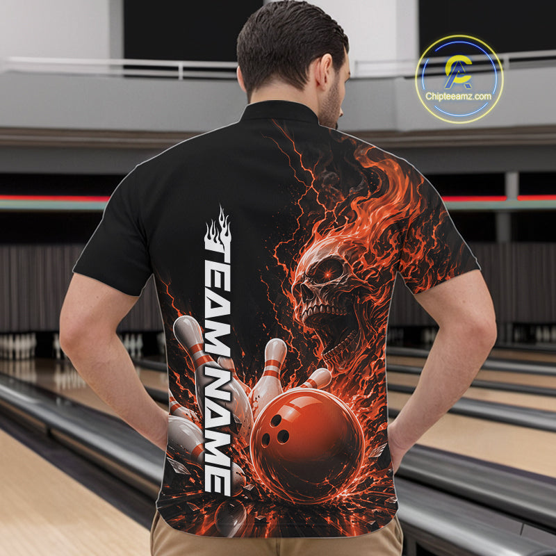 Front view of a male model in a bowling alley wearing a black bowling quarter zip shirt featuring an orange fiery skull with lightning striking a bowling ball and pins and a custom name.
