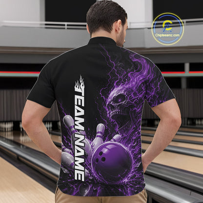 Front view of a male model in a bowling alley wearing a black bowling quarter zip shirt featuring a purple fiery skull design with lightning striking a bowling ball and pins and a custom name.
