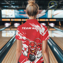 Load image into Gallery viewer, Back view of a female model in a bowling alley wearing a red custom quarter zip bowling shirt with an aggressive crawfish bowling design and a distressed background.