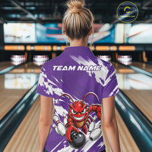 Load image into Gallery viewer, Back view of a female model in a bowling alley wearing a purple custom quarter zip bowling shirt with an aggressive crawfish bowling design and a distressed background.