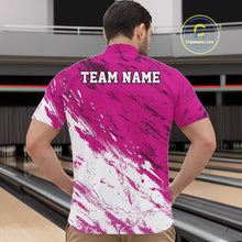 Load image into Gallery viewer, Person wearing a pink and white patterned shirt with 'TEAM NAME' text at a bowling alley.