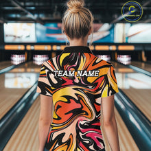 Load image into Gallery viewer, Person wearing a colorful bowling shirt with 'TEAM NAME' text in a bowling alley.