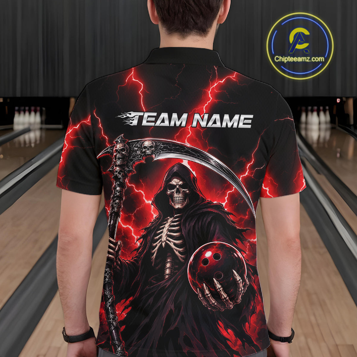 A person viewed from behind wearing a black short-sleeve shirt with a large grim reaper graphic, red lightning, and the text 'TEAM NAME' across the back. 