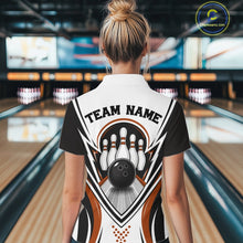 Load image into Gallery viewer, At a bowling lane, a back-view female model wears a white, black, and orange bowling quarter-zip shirt featuring bowling ball knocking down pins artwork.