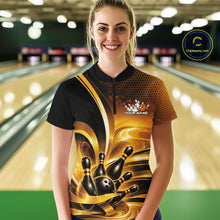 Load image into Gallery viewer, Front view of a female model at a bowling lane wearing a bowling quarter-zip shirt with glossy gold and black bowling ball and pins artwork.