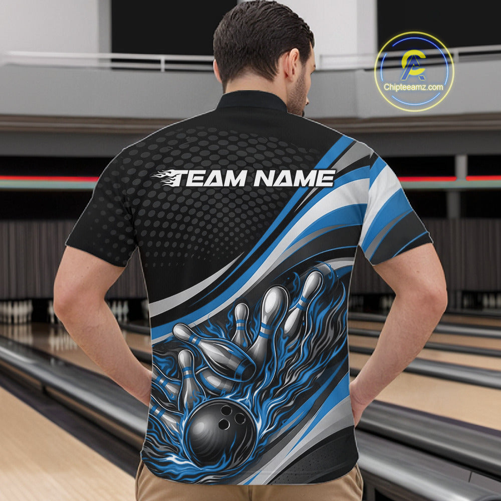 Male model in a bowling lane wearing a black and blue quarter-zip shirt, fire-themed bowling strike illustration with scattered pins.