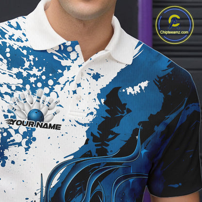Close up left chest of bowling polo shirt, black fabric with blue and white flame bowling ball and pins emblem, detailed apparel branding perspective
