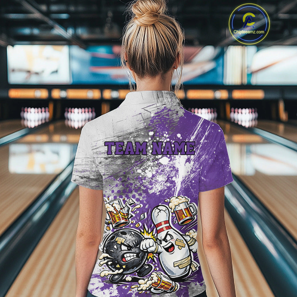 Back view of a female model in a bowling lane wearing a purple and white grunge splatter polo shirt featuring playful cartoon bowling action graphics.