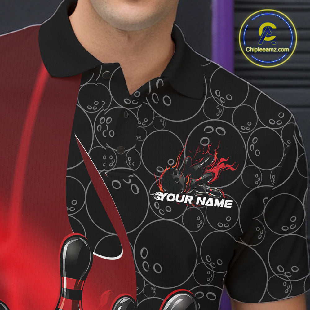 Close-up view of the left chest of a black and red bowling polo shirt showing gradient bowling ball pattern with flaming strike artwork detail.