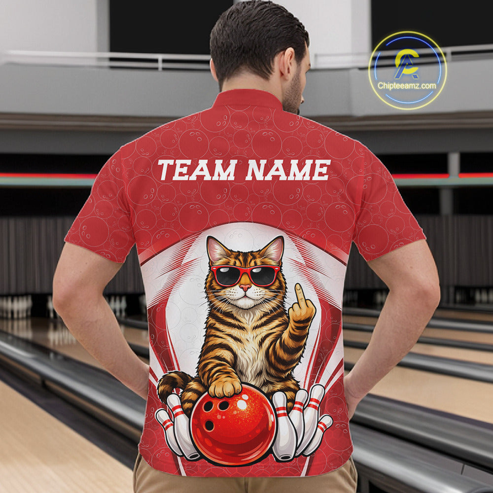 Front view of a male model in a bowling venue wearing a white and red quarter-zip shirt showcasing a golden brown Bengal cat beside a bowling ball.