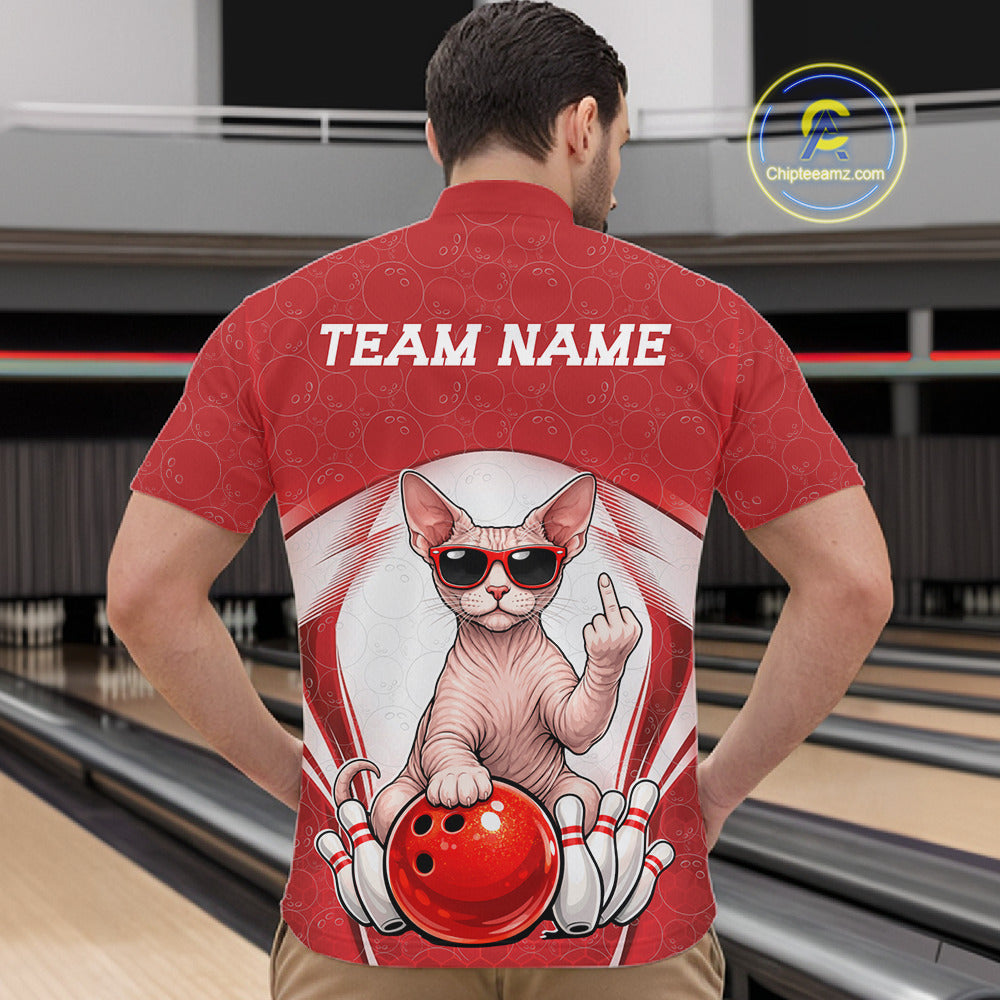 Front view of a male model in a bowling center wearing a bowling quarter-zip shirt featuring a sphynx cat and bowling ball motif.