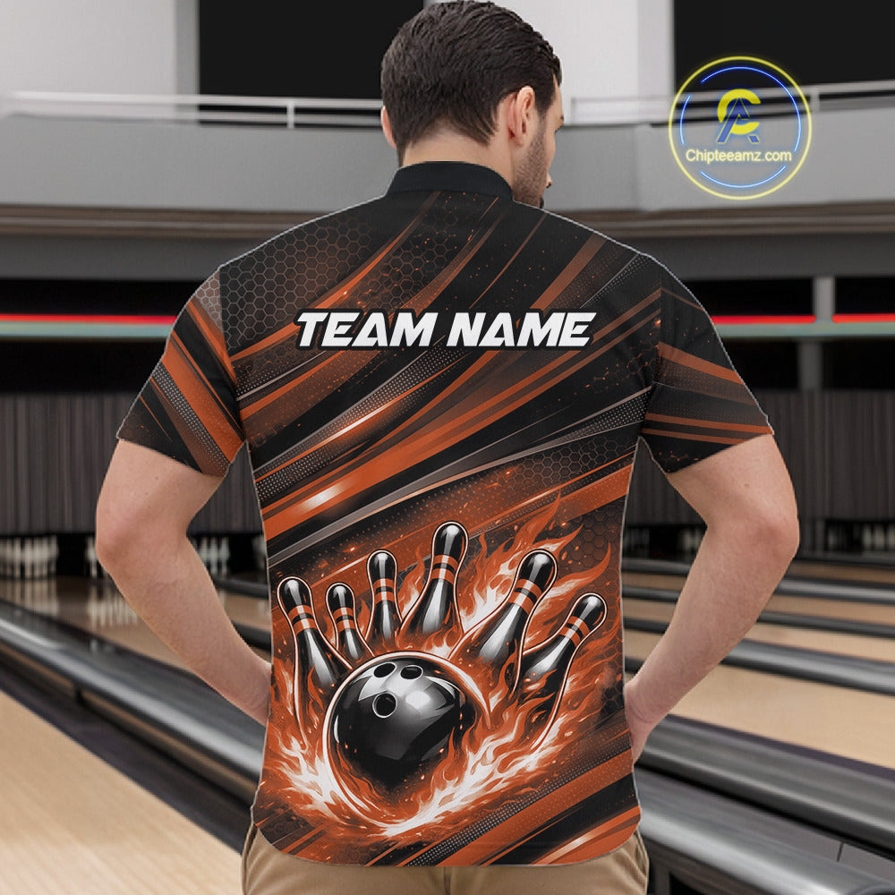 Front view of a male model in a bowling center wearing a black and orange quarter-zip shirt featuring a flaming bowling ball and pin motif.