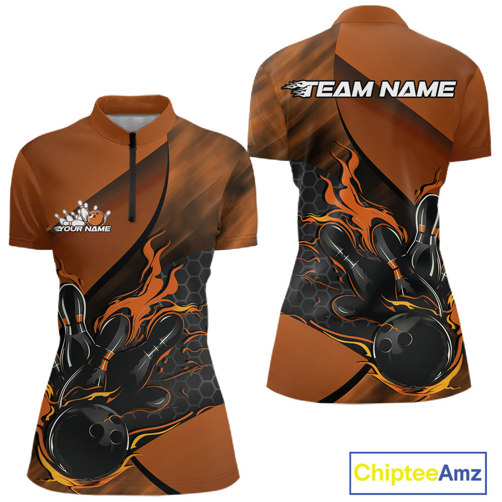 Women’s quarter zip bowling shirt mockup displaying black and orange shirt with flame bowling ball striking pins and hexagon pattern design