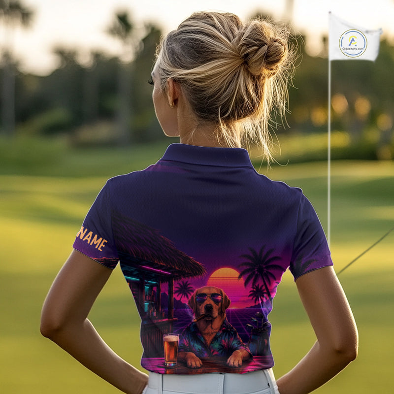 Woman wearing a purple golf shirt with a dog graphic on a golf course