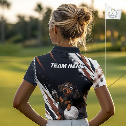 A woman on a golf course seen from behind, wearing a custom short-sleeve polo shirt with a dachshund graphic and 'TEAM NAME' text on the back.