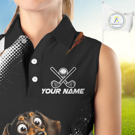 A sleeveless black polo shirt with a custom graphic design, shown on a model. The shirt features a white crossed golf club and golf ball logo above the placeholder text 'YOUR NAME', with a dachshund graphic at the bottom left