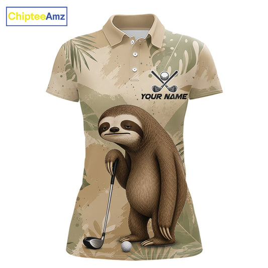 A women's short-sleeve polo shirt in a beige and green camouflage pattern, featuring a cartoon sloth holding a golf club with a golf ball. The shirt has a customizable design with the text 'YOUR NAME' and a golf ball and clubs graphic on the chest.