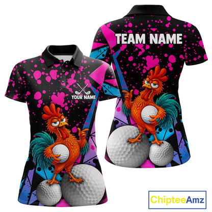 Custom short-sleeve polo shirt shown from front and back on a white background. The shirt has a black base with bright pink, blue, and purple paint splatter graphics, featuring a cartoon rooster holding a golf ball and large golf balls on the front, with 'TEAM NAME' and 'YOUR NAME' text areas on the back and front chest respectively.