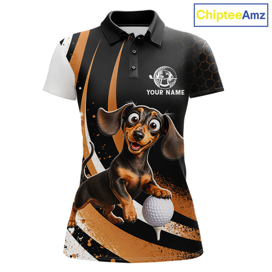 A short-sleeve polo shirt with a black, white, and brown abstract background, featuring a large cartoon dachshund graphic holding a golf ball on the front. The shirt has a black collar, a three-button placket, and a white logo area on the chest that reads 'YOUR NAME'.
