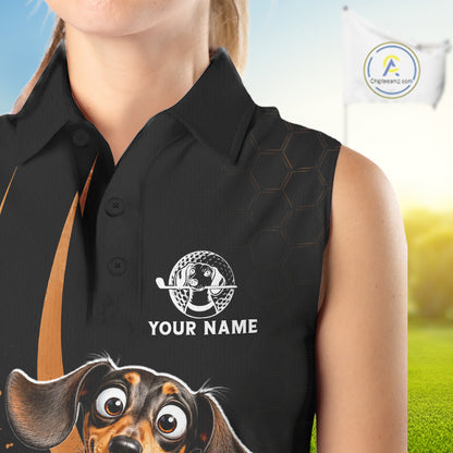 A sleeveless black polo shirt with a custom graphic of a dachshund dog and white placeholder text reading 'YOUR NAME', shown on a model against a golf course background.