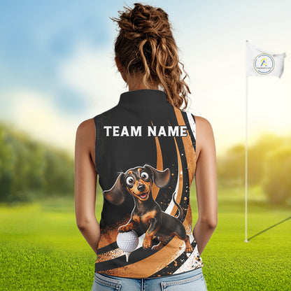 A woman viewed from behind wearing a sleeveless black polo-style golf shirt with a custom graphic of a dachshund playing golf and the text 'TEAM NAME' printed on the back. The background shows a blurred golf course with a flag.