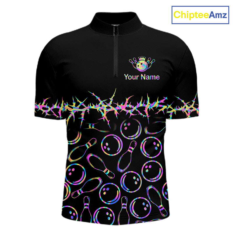 A black short-sleeve quarter-zip athletic shirt with bowling-themed graphics, including bowling pins, bowling balls, and a rainbow-colored foil burst across the chest and sleeves. The shirt features a mock collar and a zipper, with 'Your Name' and a crown graphic on the left chest.